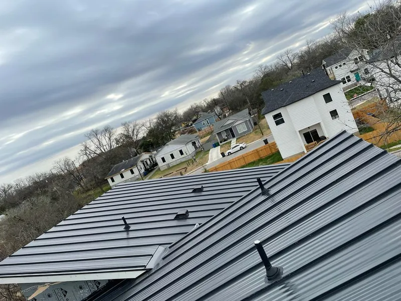 Standing seam metal roof panels with vents for Skylight Repair in Peabody